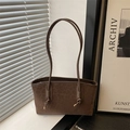 Brown leopard print suede tote bag with elegant knot straps and golden metallic accents - Brown