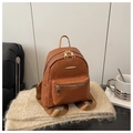 Mini zaino da donna in pelle intrecciata marrone con cerniere dorate e stile trendy - Marrone