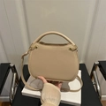 Minimalist beige leather shoulder bag with top handle and gold metal hardware for women - Khaki