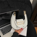 White crocodile pattern half-moon bag with gold buckle and circular metal handle - White
