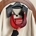 Red crocodile embossed leather crescent shoulder bag with elegant gold metal clasp - Red