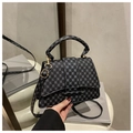 Detail of trendy crossbody bag with grey geometric circles and gold metal hardware - Round Black