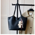 Close-up of black leather tote bag with gold lettering and cute bear charm pendant - Black (With Charm)