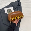 Sleek brown leather underarm bag with unique wavy gold metal accent and chain strap - Brown