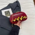 Chic burgundy semi-circular clutch bag with elegant golden wavy metal trim and gold chain - Burgundy