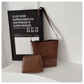 Detail of brown suede patchwork bucket tote bag with a matching zipper clutch set - Brown