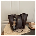 Deep brown retro PU tote bag with a rabbit charm on a cozy autumn knit background - With Charm / Brown
