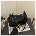 Glossy black patent leather crescent shoulder bag with elegant gold hardware - Black
