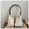 Minimalist white corduroy shoulder bag with brown leather strap and metal buckle finish - White
