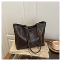 Deep brown vintage tote bag in glossy faux leather on a cozy cashmere scarf - Coffee Without Pendant
