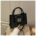 Chic black crossbody bag with golden M buckle and all-over monogram pattern design - Black