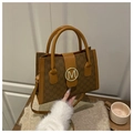 Brown monogram crossbody bag with golden M buckle and adjustable shoulder strap - Brown