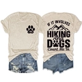 Detail of hiking and dog theme graphic print on a beige crew neck short sleeve t-shirt - Sand (Black Print)