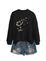 Detail of black sweatshirt with dandelion book print and distressed denim shorts - S / Black