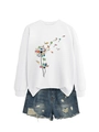 Close-up of white sweatshirt featuring creative dandelion and book print on fabric - S / White