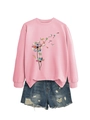 Flat lay of pink long sleeve sweatshirt with dandelion book print and ripped denim shorts - S / Pink