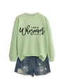 Close-up of olive green sweatshirt with religious text and ripped denim shorts - S / Olive Green (Black Font)