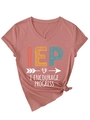 Detail of V-neck T-shirt in dusty rose with IEP graphic print and trendy side knot hem - Rose Gold (White Print)