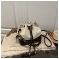 Two-tone beige and brown bucket bag with braided handle and drawstring closure - Khaki
