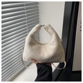 Detail of soft white faux fur hobo bag with metal chain zipper and slim shoulder strap - White Large