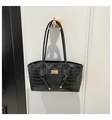 Detail of black crocodile texture leather tote bag with rectangular gold metal logo plaque - Crocodile Pattern Style / Black