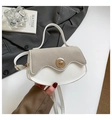 Chic two-tone shoulder bag with grey suede flap and golden twist lock detail - White