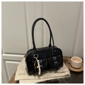 Glossy black Boston shoulder bag with silver buckles and a beaded tassel charm - Black