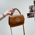 Brown quilted leather handbag with gold M logo and adjustable shoulder strap - Brown