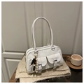 White patent leather Boston bag with dual pockets and stylish beaded charm detail - White
