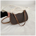 Detail der Vintage-Baguette-Tasche aus taupefarbenem Canvas mit braunem Lederbesatz - Dunkelbraun