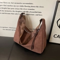 Dark coffee suede hobo bag with wide fabric strap and fringe detail in vintage style - Brown