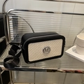 Minimalist black leather and beige woven crossbody bag with silver M logo and wide strap - Black