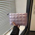 Quilted light purple cosmetic bag with padded down-like design and zipper closure - Purple