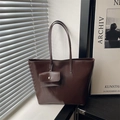 Brown leather tote bag with matching chain pouch, minimalist commute shoulder bag style - Brown