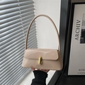 Bolso de mano minimalista de charol beige con cierre dorado redondo y asa larga - Caqui