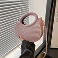 Pink sequin handbag with semi-circular silhouette and vertical stripe embossing detail - Pink