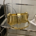 Metallic gold crocodile pattern shoulder bag with eyelet strap on a sleek metal stand - Gold Metallic Crocodile Pattern (JQS397) / Gold