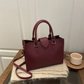 Deep red lychee grain leather handbag with gold hardware and removable shoulder strap - Red