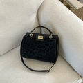 Chic black leopard texture shoulder bag with golden lock and adjustable strap - Black