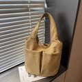 Minimalist khaki bucket bag with double front pockets for commuting and daily wear - Khaki