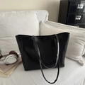 Minimalist black tote bag in smooth matte finish for women, perfect for daily commuting - Black