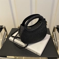 Sparkly black crescent crossbody bag with quilted pleats and gold metal hardware - Black