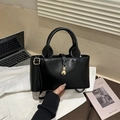 Classic black PU leather commuter bag with a gold gourd pendant and round handles - Black