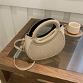 Elegant champagne gold sequin handbag with circular handle and detachable strap - Gold