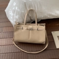 Beige woven texture tote bag with buckle detail and adjustable shoulder strap - Off White