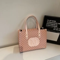 Pink PU tote bag featuring M monogram pattern and embossed logo with leather handles - Pink