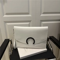 Minimalist white leather envelope clutch bag featuring a sleek black crescent buckle - White