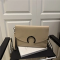 Beige envelope clutch bag with black semi-circular buckle and leather wrist strap - Khaki