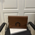 Brown leather envelope clutch bag with horseshoe metal buckle and wristlet strap - Brown