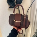 Dark brown saddle bag in synthetic leather with woven texture and gold crescent metal - Coffee